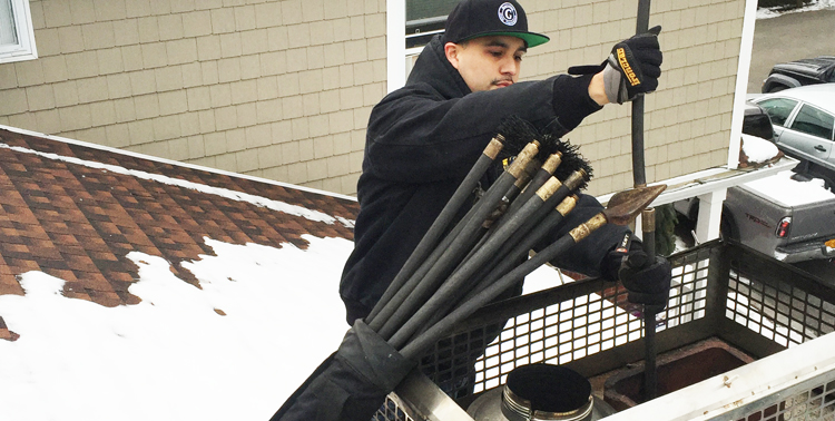 Man sweeping a chimney